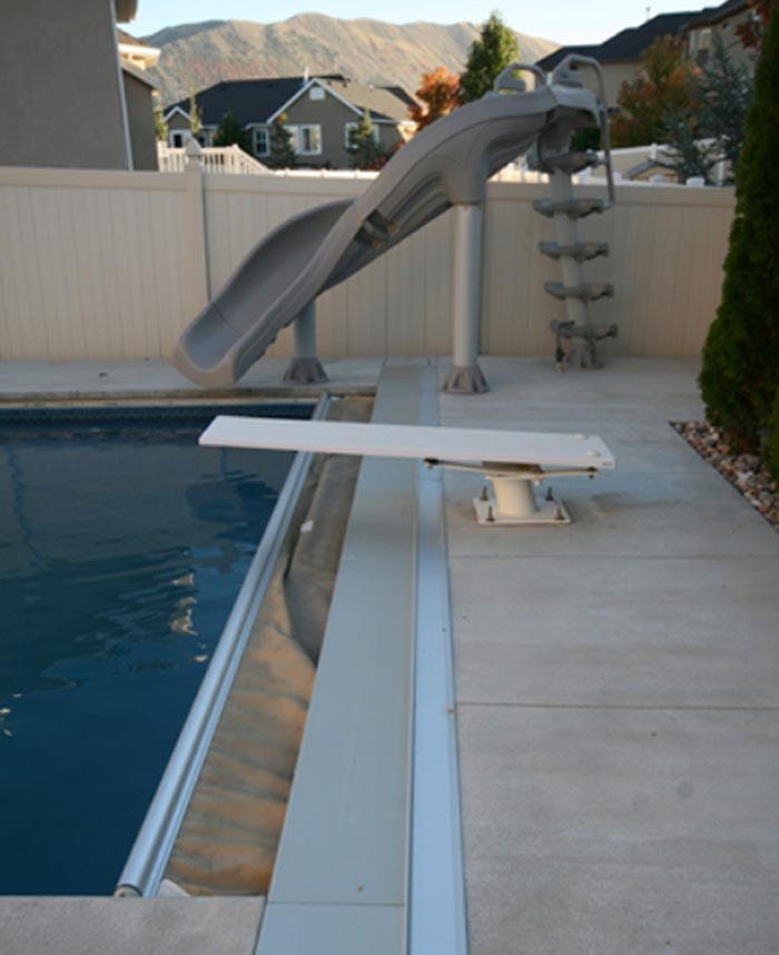 diving board and slide into pool